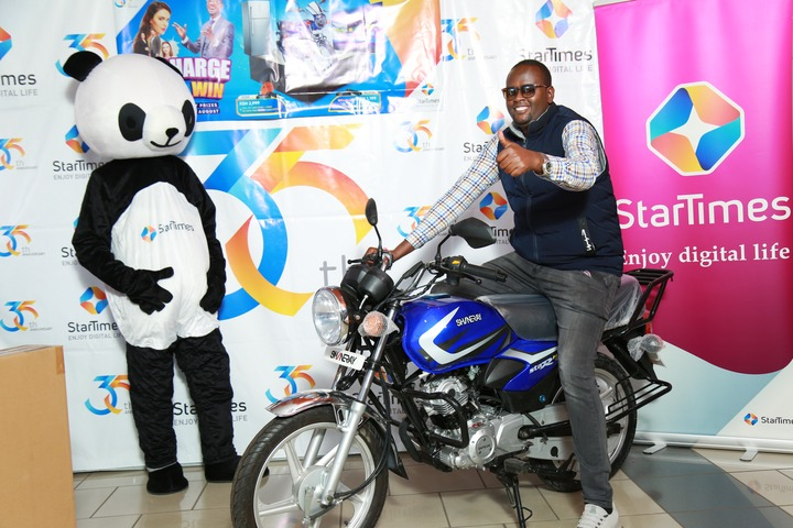 Startimes Awards Lucky Winners with Motorcycle and Smart TV